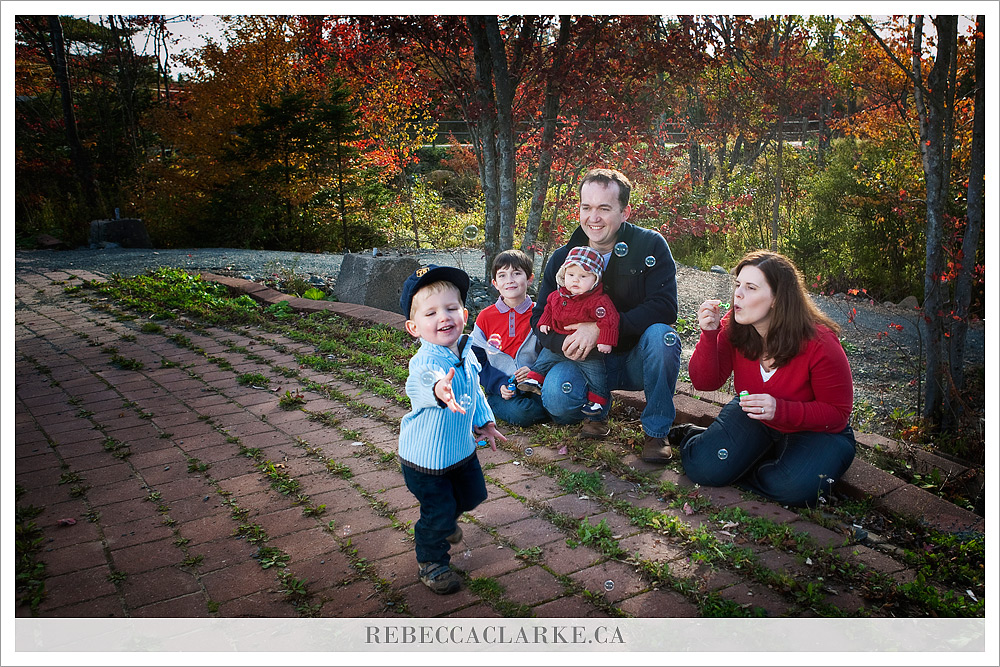 Blowing bubbles, family session