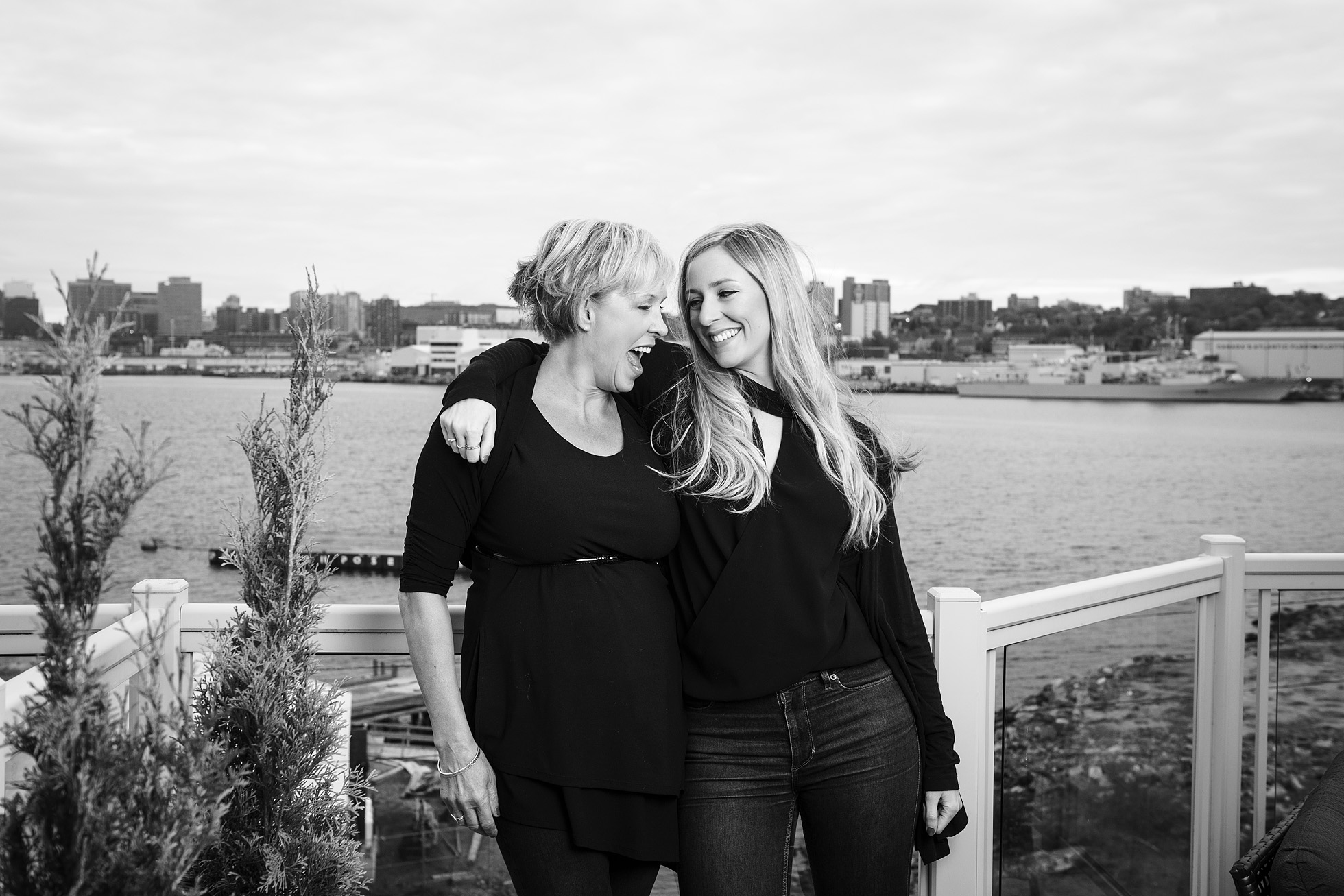 Mother and daughter family photo with Halifax waterfront in the background