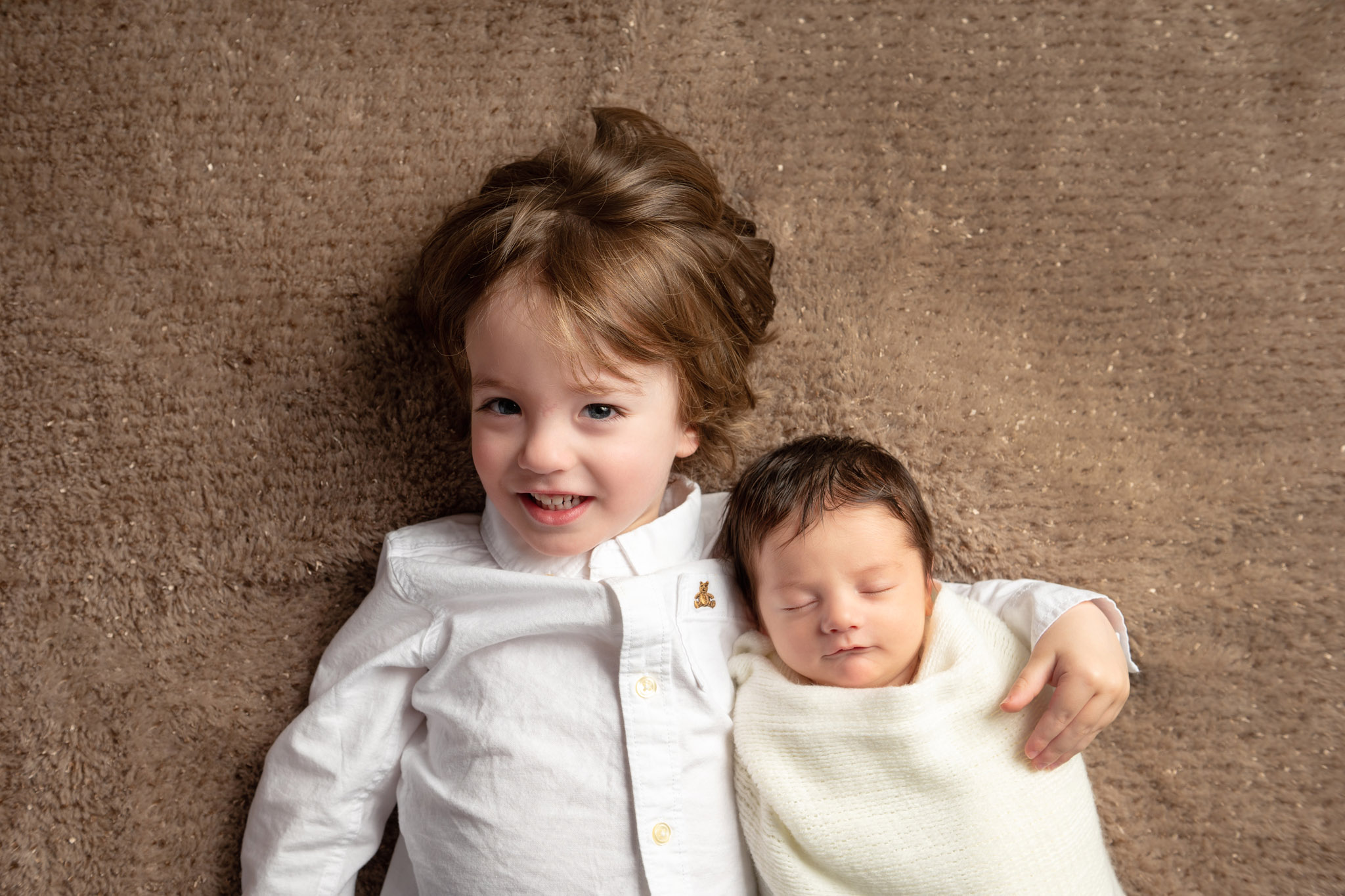 Newborn with sibling photo shoot