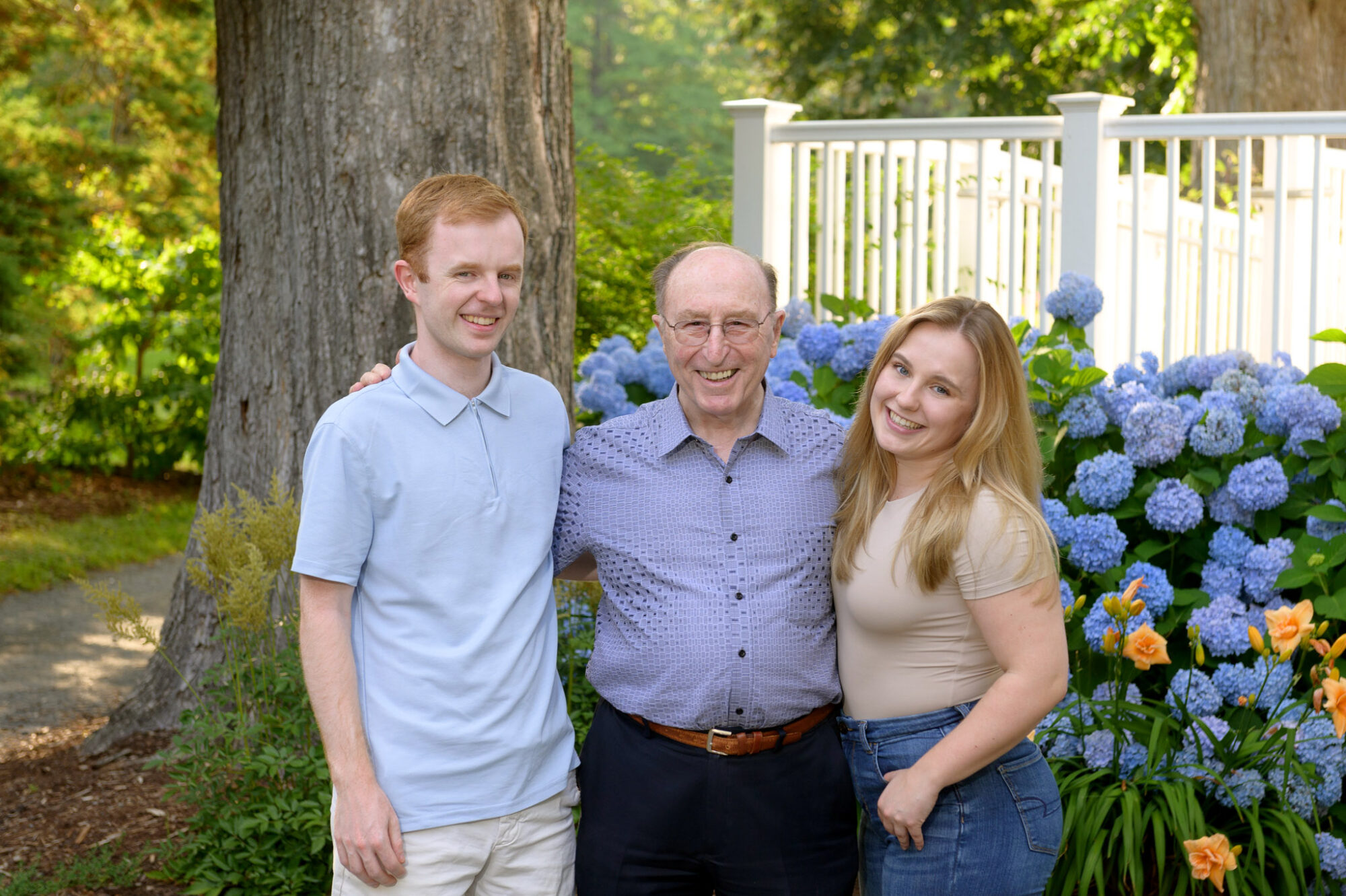 grandfather posing for a photo with grandkids at Point Pleasant Park