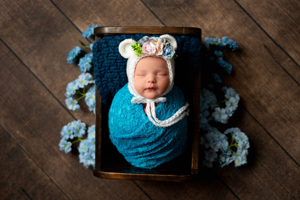 Newborn baby girl in blue tones. Halifax, Nova Scotia