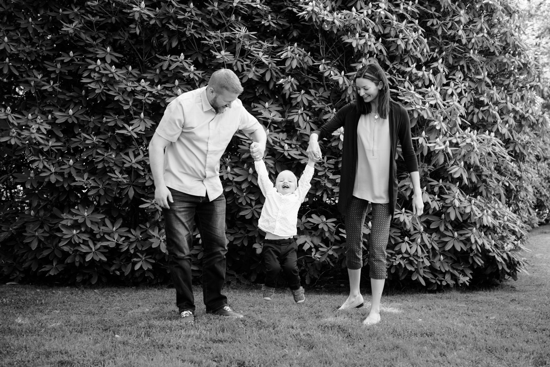 Halifax public gardens family photo session with parents swinging todler