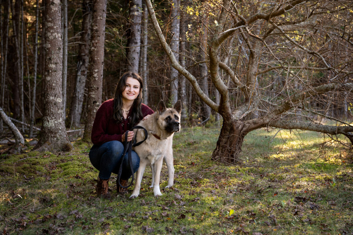 Halifax pet photographer Rebecca Clarke captures an American Akita dog with her owner outside