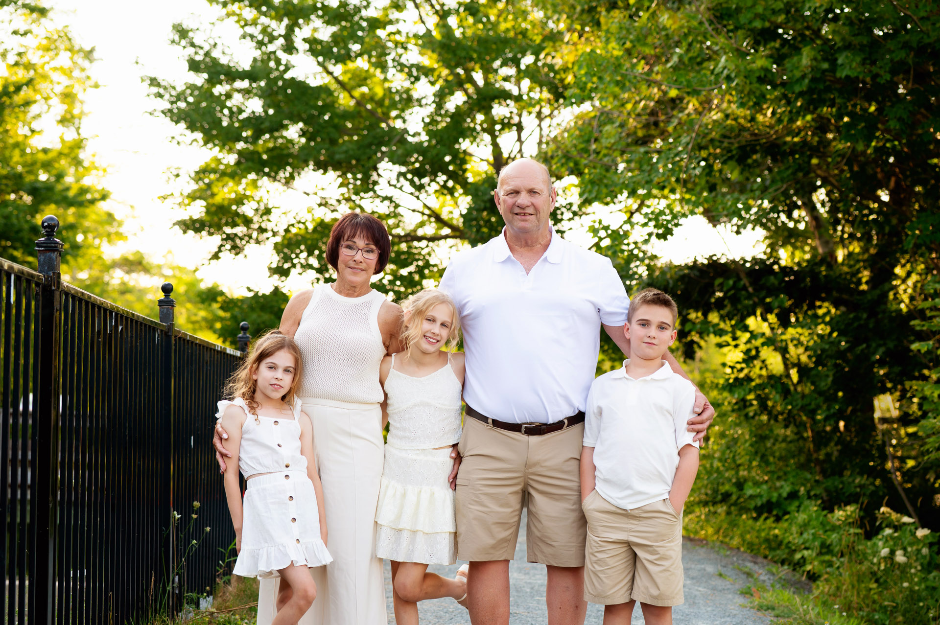 Grand parents with grandkids in extended family photography session