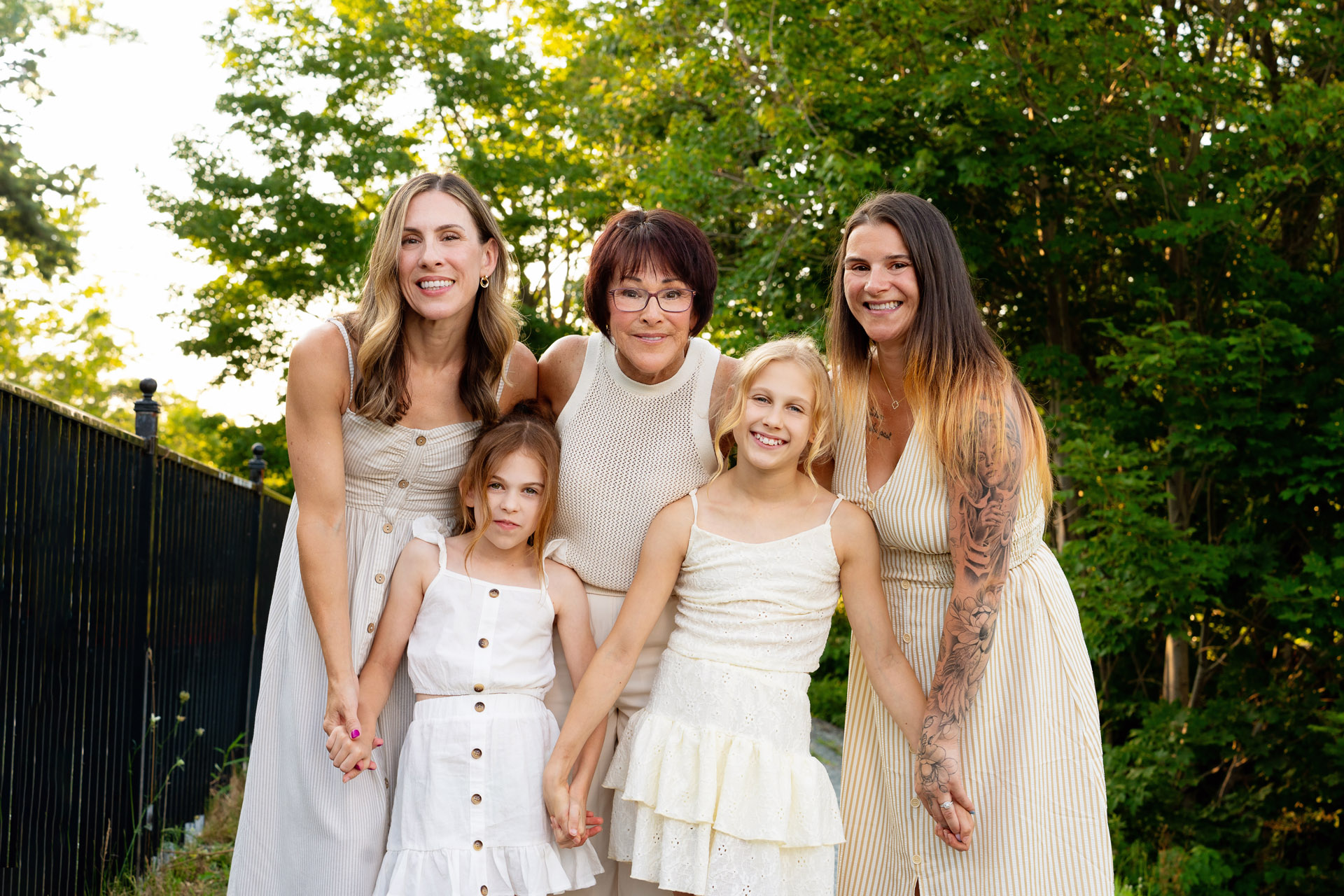 extended family photoshoot with grandmother, daughters and children