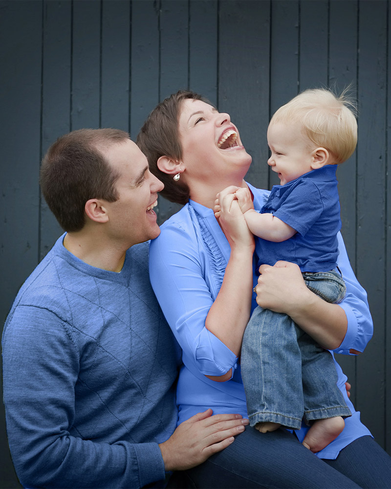 Happy family posing for family photos at York Redoubt National Historic Site